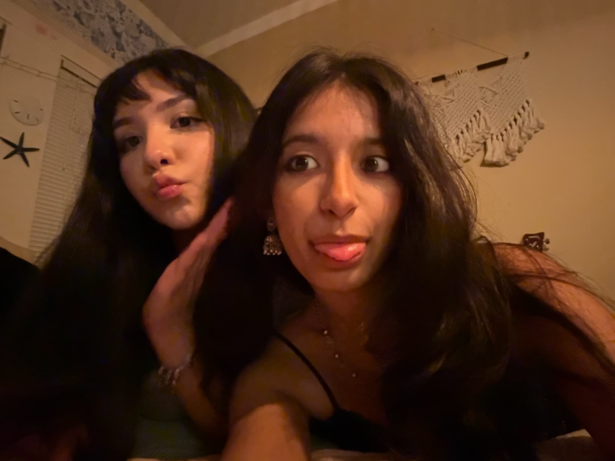 Nimita and Ashley posing happily before going out on a tuesday night.