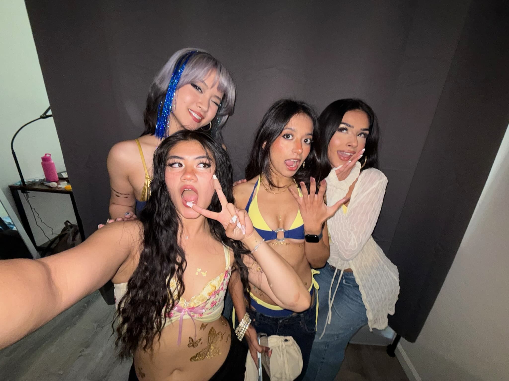 Mei, Erin, Haleema, and Nimita taking a group selfie at Cal Day.